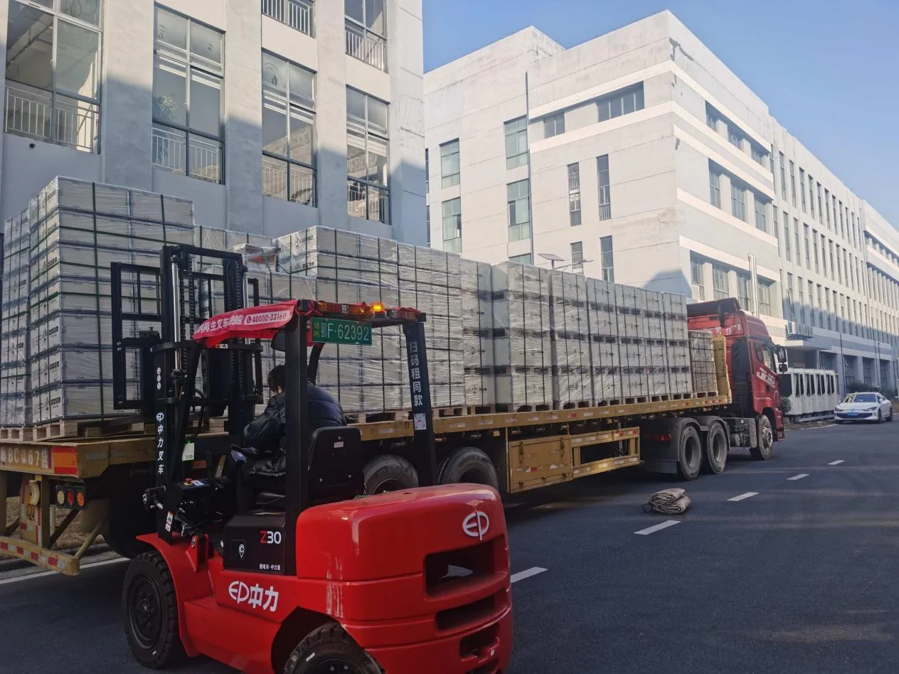 Residential battery products being loaded for shipment at the YAHUA facility